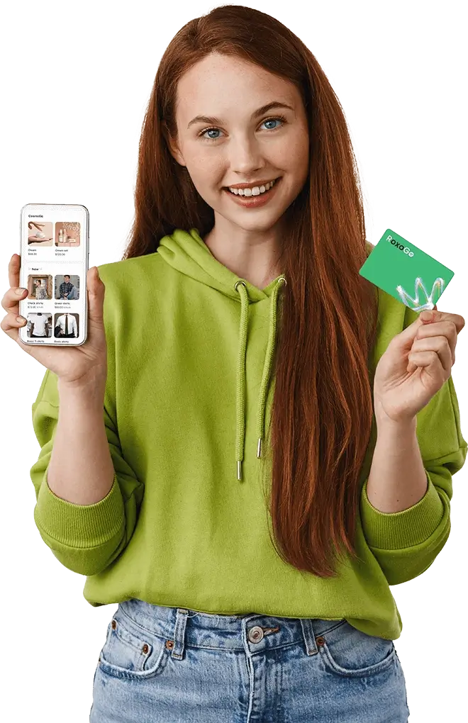 Woman holding a phone with her RoxoGo digital store open and a RoxoGo NFC card